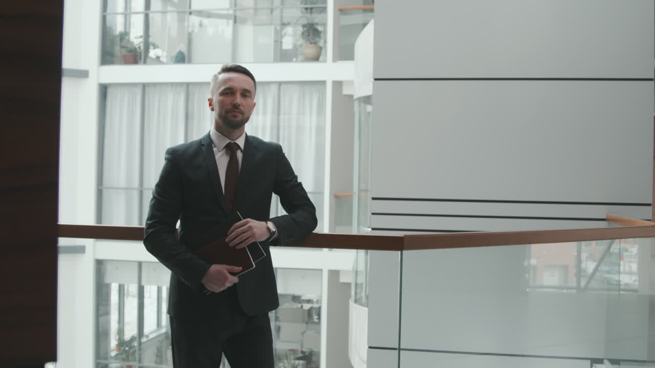 Portrait of Young Business Man in Modern Office