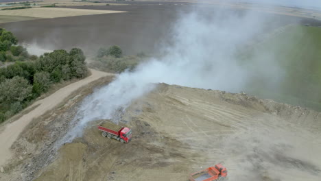 landfill with burning waste