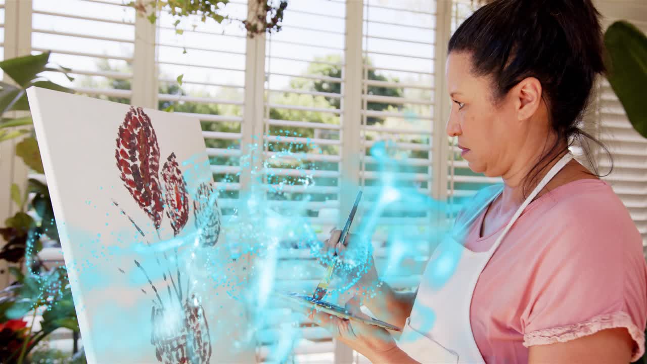 Woman standing at canvas painting floral art, brush applying strokes sparking cyan swirl over hands