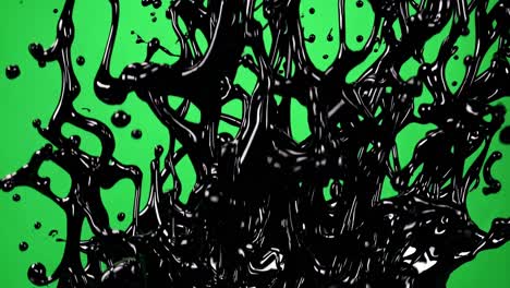 black liquid splashing on green screen