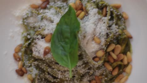 top down pesto pasta with blur background