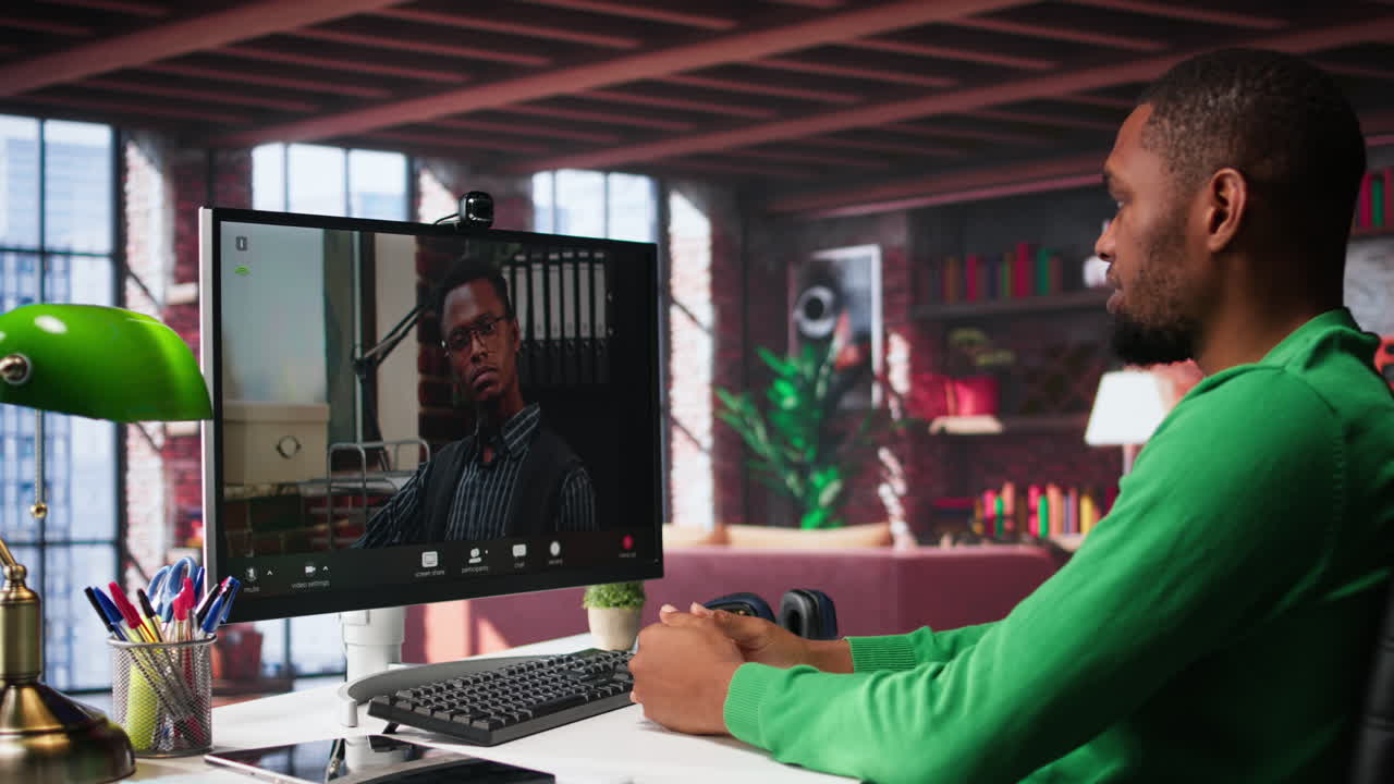 Male worker calls manager remotely using internet video call