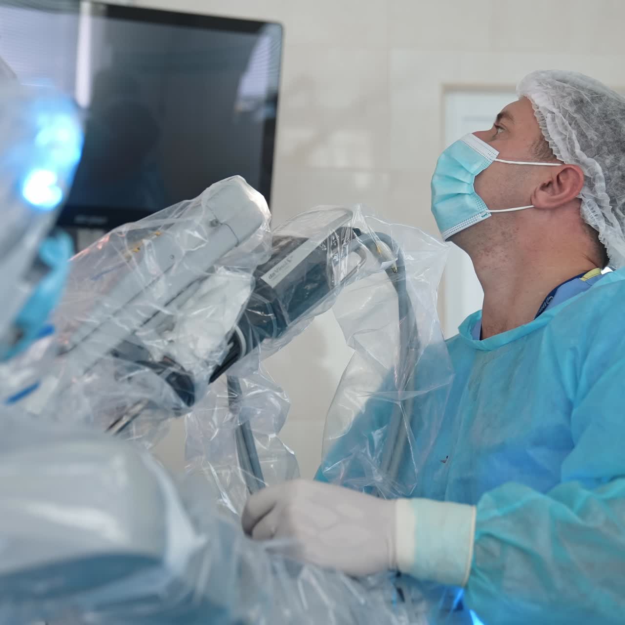 Surgery team in the operating room. Surgeon in hospital surgery in sterile uniform in operating theater