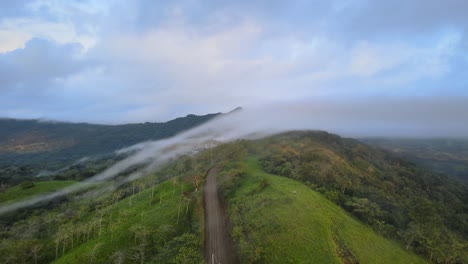 Flight-over-the-mist-in-the-dense-tropical-forests,-4K,-landscape
