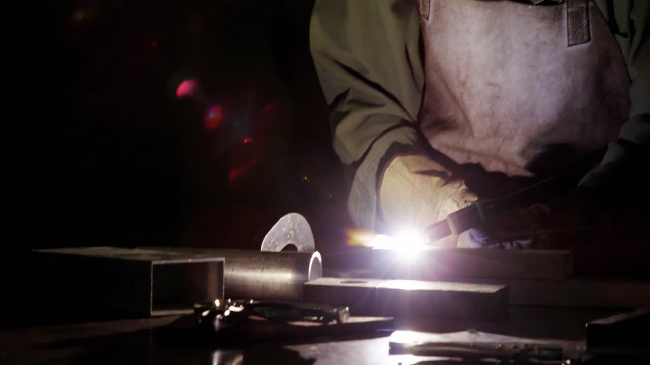 Welder welding a metal