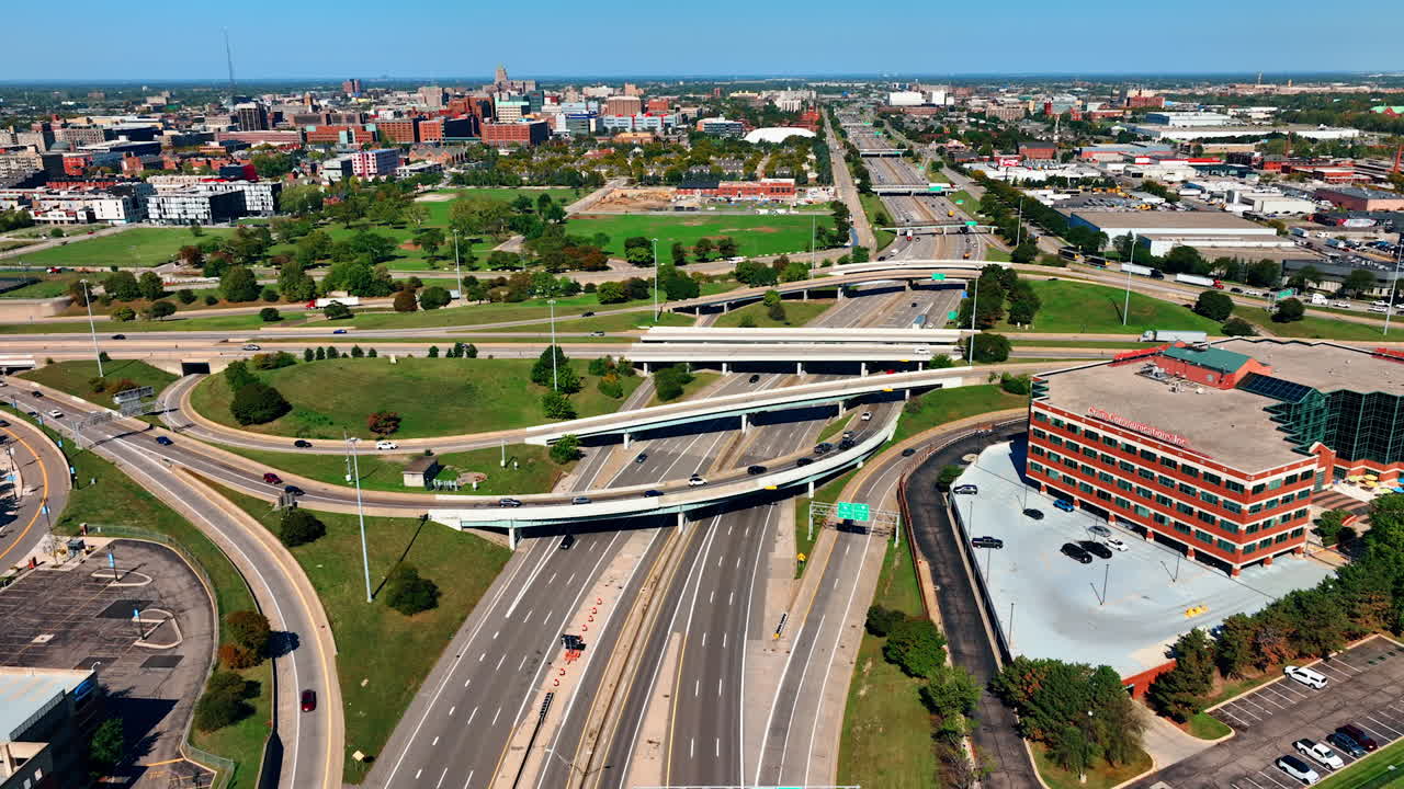 Detroit, USA, 28 July 2025: Transport moves by the highways and trestles in the complicated system of roads. Traffic in Detroit, Michigan, USA. Aerial view