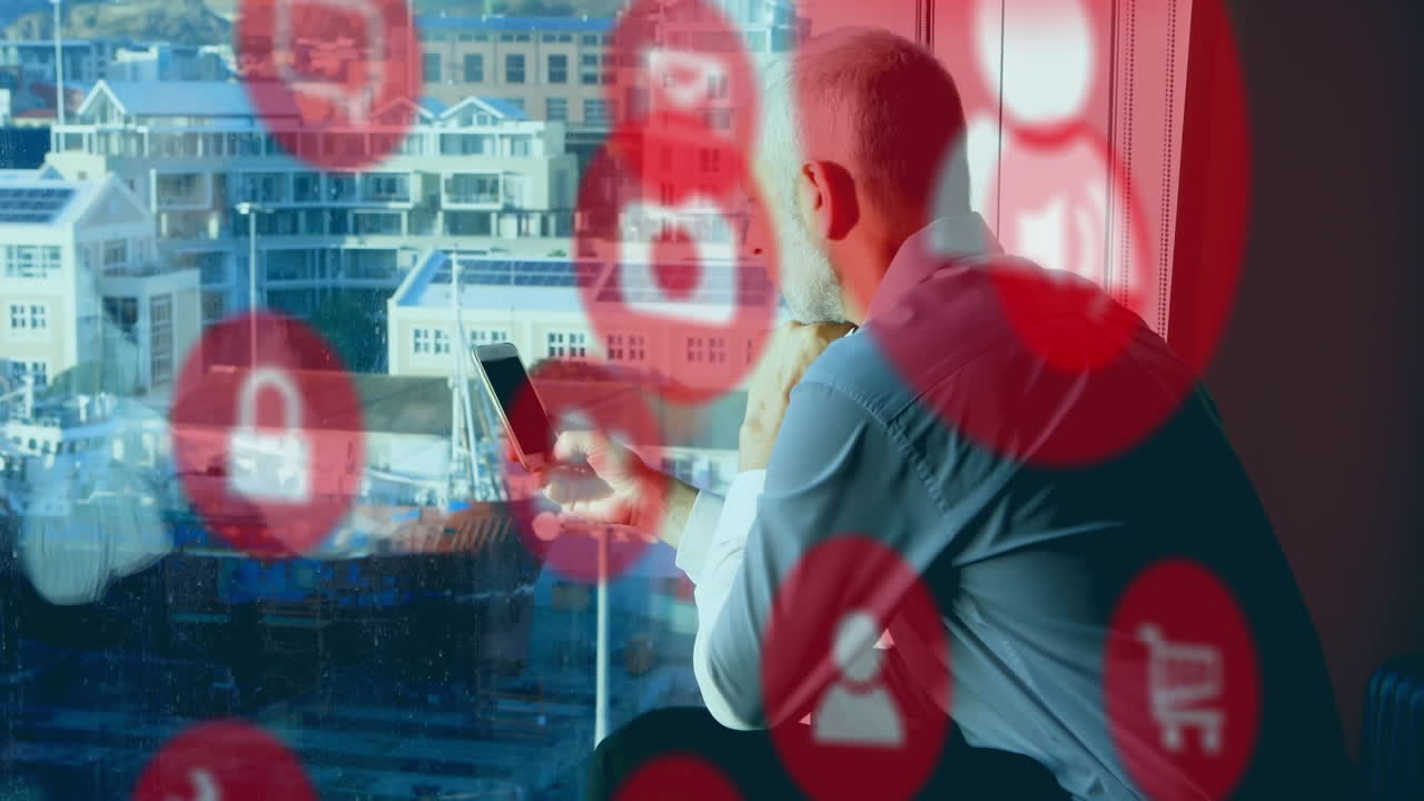 Animation of network of connections with icons over businessman using smartphone