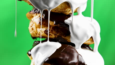 stack of dripping cream puffs