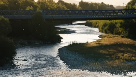 Daytime-capture-of-bridge-over-the-Drôme-River,-an-picturesque-waterway-that-flows-through-the-town-of-Crest-in-the-Auvergne-Rhône-Alpes-region-of-France