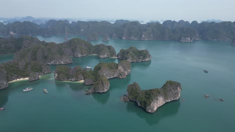 drone shot of epic islands in cat ba and halong bay in northern vietnam