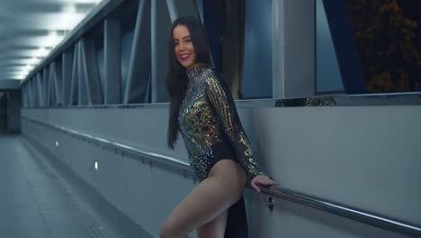 amazing hispanic girl in a overpass wearing a sparkle dress at night in the caribbean city of port of spain, trinidad