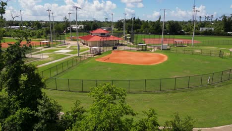 baseball field and scrap metal yard: a contrast of recreation and waste