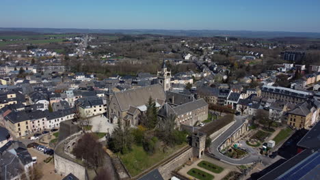 aerial view of a european town with a church and historical buildings
