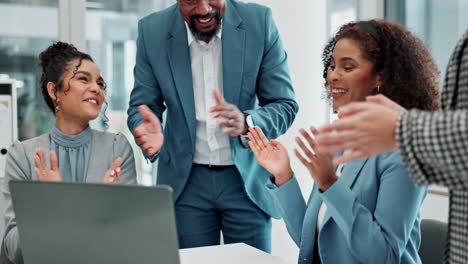business team celebrating success in the office