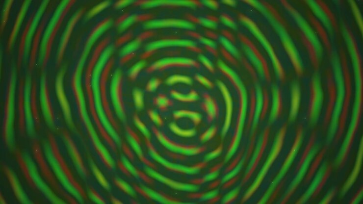 Abstract Green and Red Concentric Ripple Pattern Animation