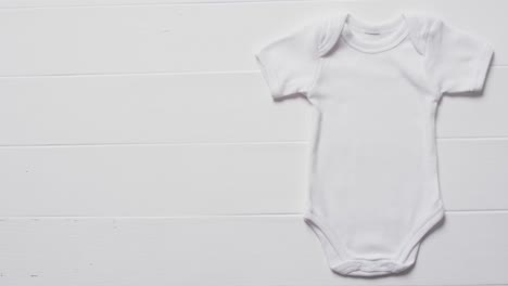 video of white baby grow with copy space on white background