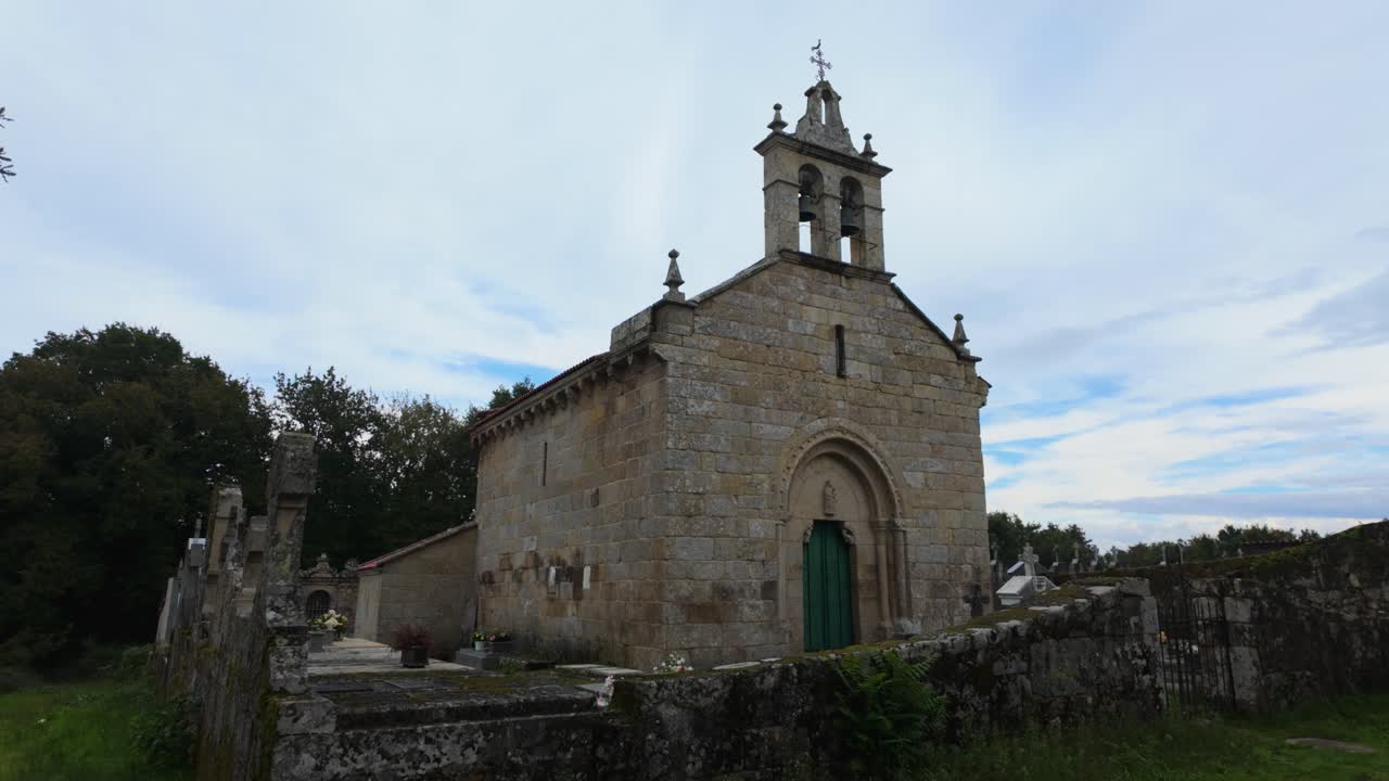 Exterior view of San Paio de Albán church with scenic surroundings in Coles, Galicia, Spain