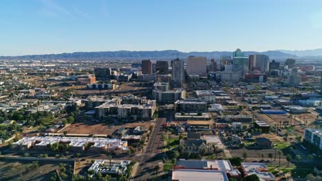 skyline and downtown of phoenix, arizona, usa, forward drone flight