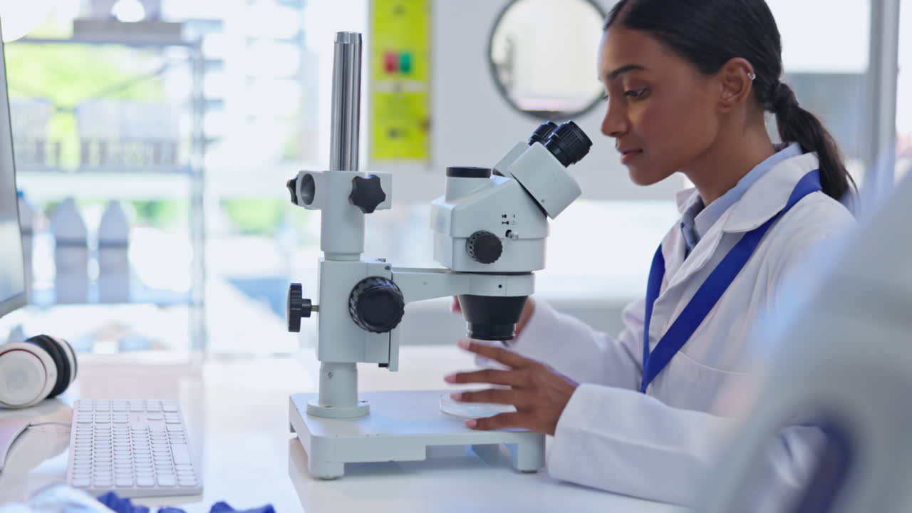 Science, microscope and Indian woman in laboratory