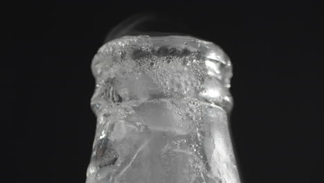 opening the cold drink bottle