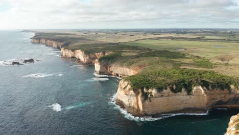 aerial view of dramatic coastal cliffs and ocean