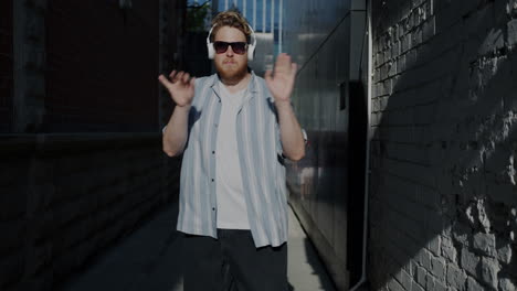 man dancing in an alley