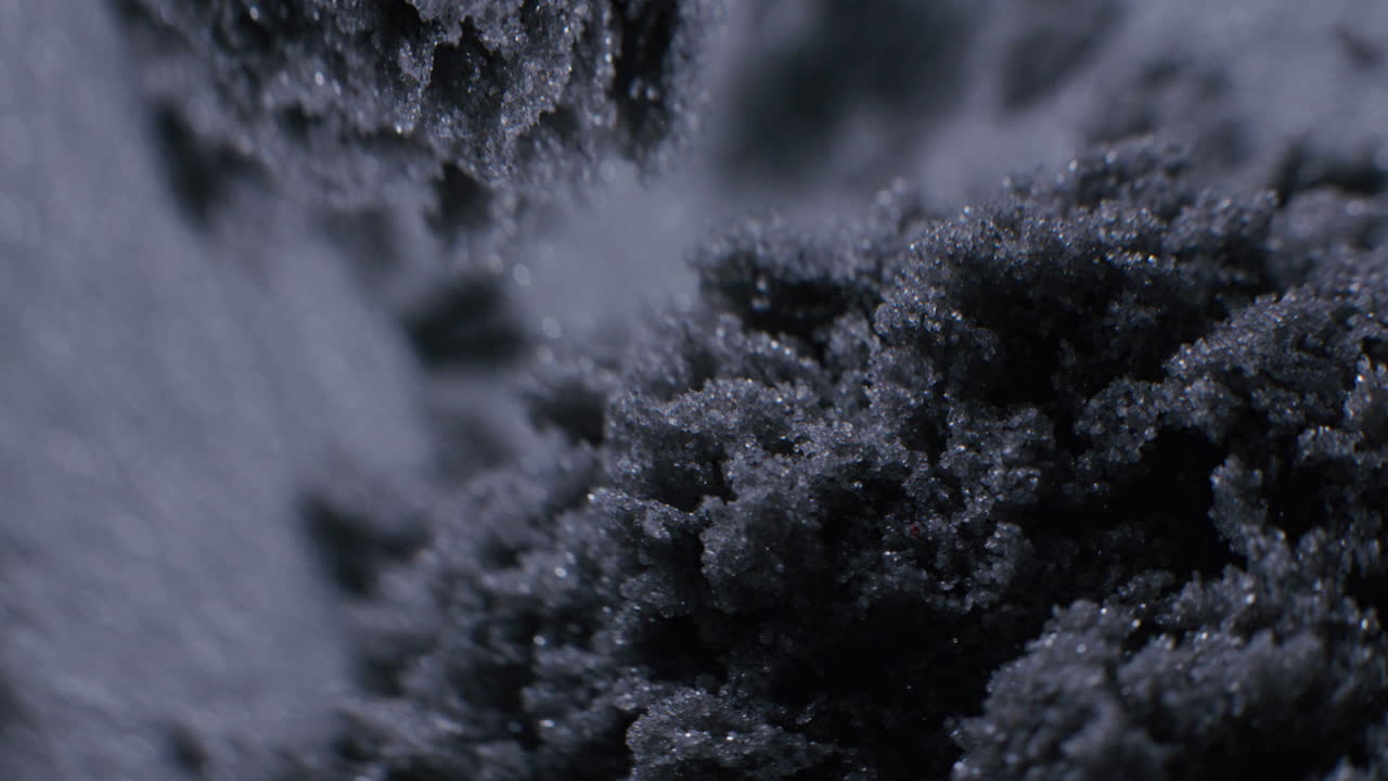 Close-up view of a dark substance