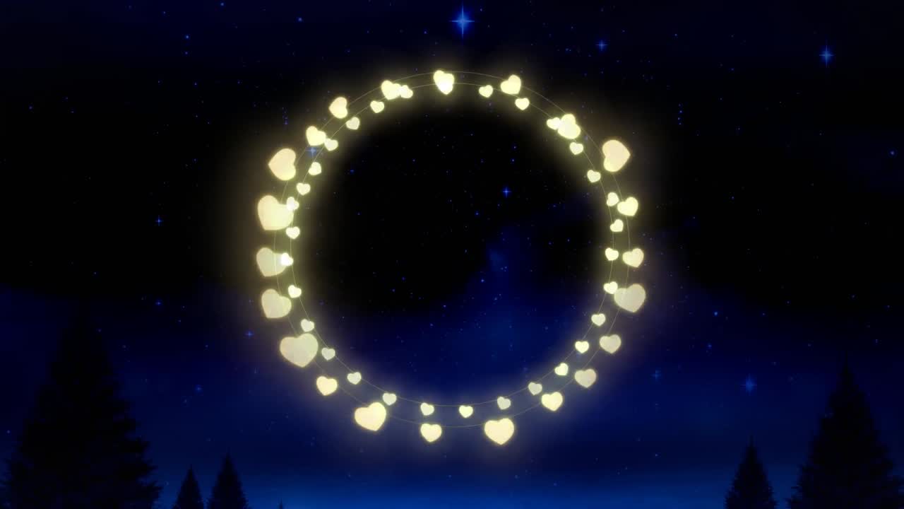 Animation of fairy light frame with copy space over fir trees and winter scenery