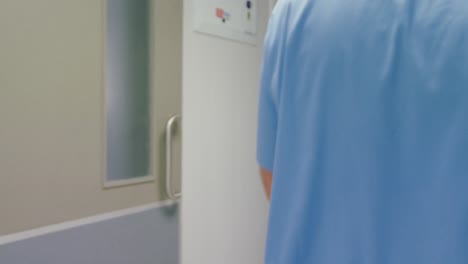 surgeon walking in hallway