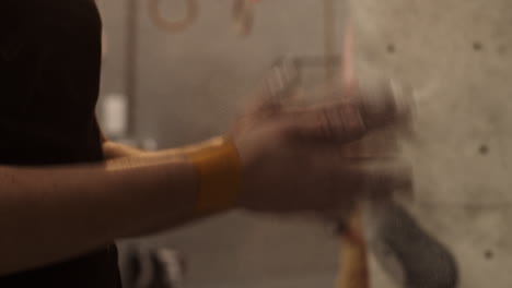 rock climber applying chalk