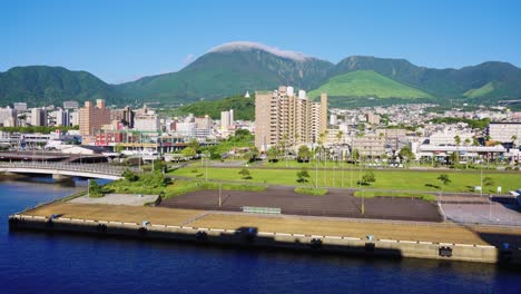 beppu city in kyushu japan, establishing shot of seaside on sunny day