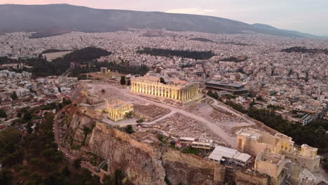 historical landmarks on rocky outcrop overlooking city of athens in greece