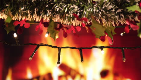 christmas lights, garland and fireplace at home