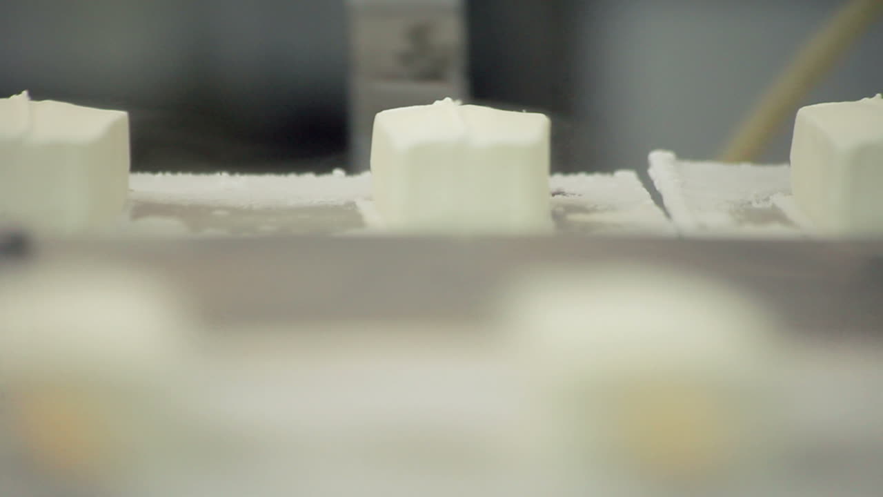 Ice cream on conveyor belt. Food processing line. Ice cream production line
