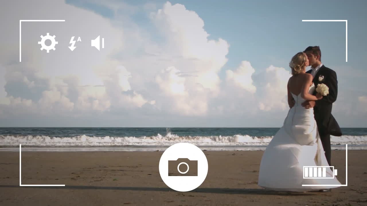 Taking photos of a bride and groom on a digital camera