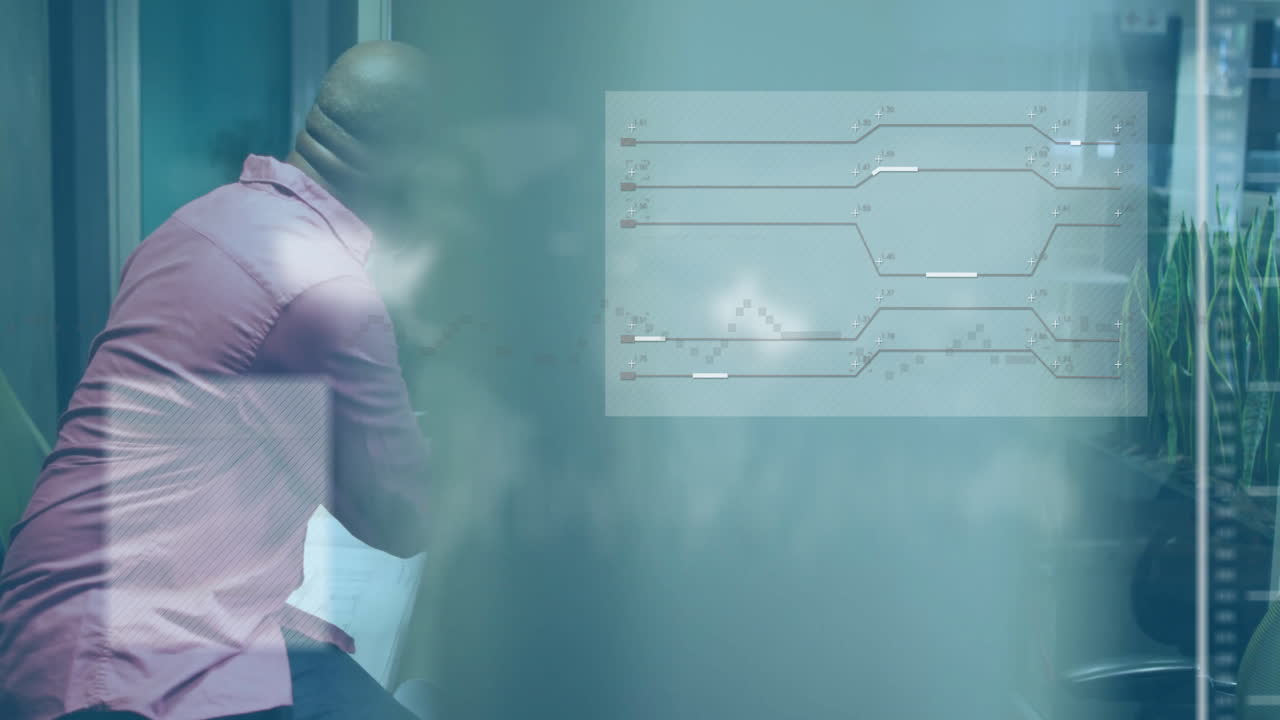 Senior office worker reviewing line graphs on glass interface, displaying business data analytics