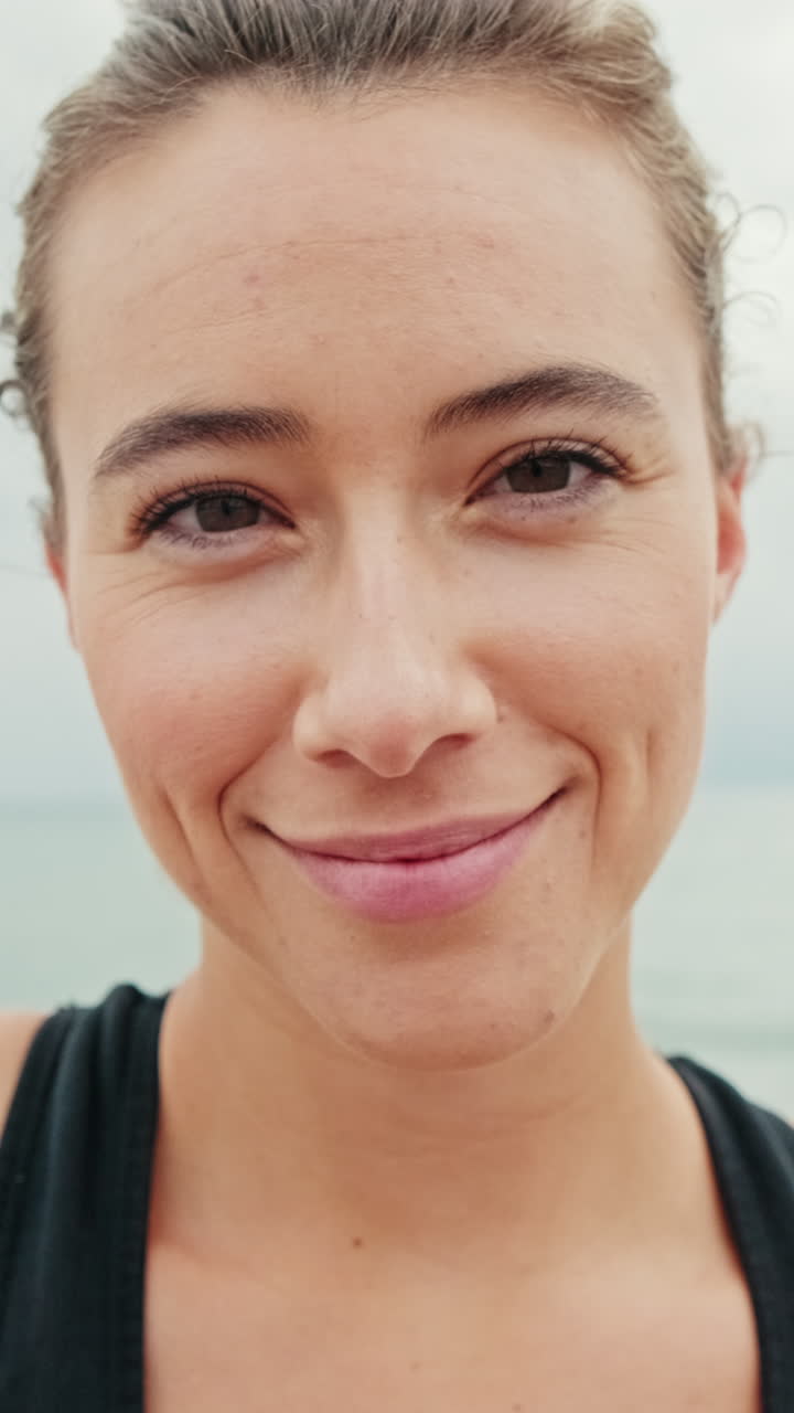 Fit Woman Smiles After Beach Workout