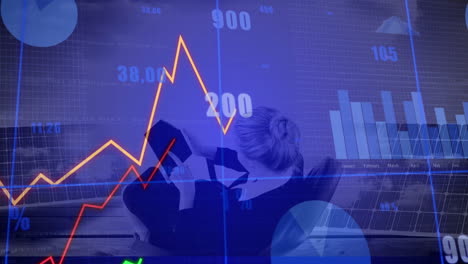 businesswoman analyzing financial graphs and charts with data processing animation