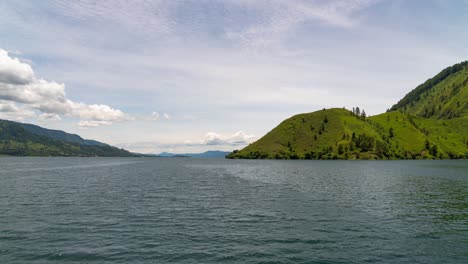 scenic lake and green mountains landscape