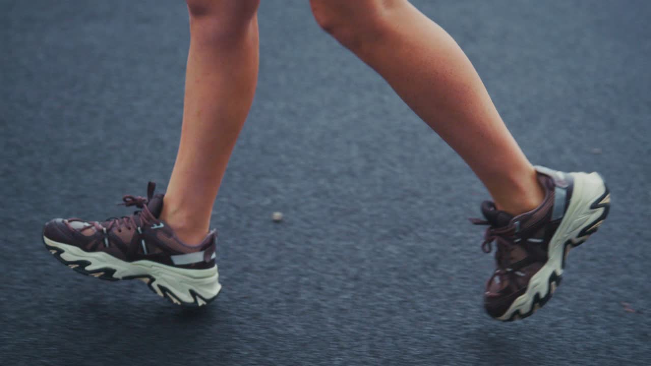 Legs Running in Athletic Shoes