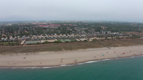 Seaside-mediterranean-sea-vacation-destination-France-aerial-view-over-a-sandy