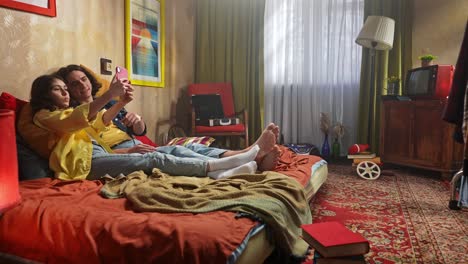 couple taking selfie in a retro bedroom