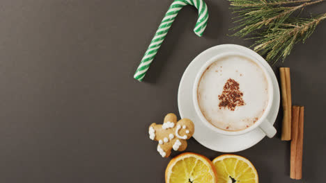 Video-of-cup-of-hot-chocolate-with-cinnamon-over-grey-background