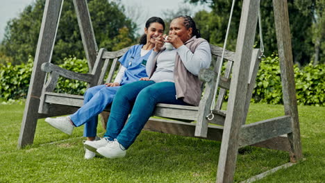 Happy-woman,-nurse-and-patient-on-park-bench