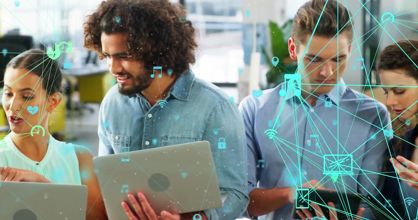 Diverse Team Collaborating on Digital Projects in Modern Office