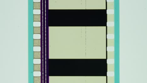 cinta de película cinta de película de 35mm carrete de cine viejo vintage suciedad polvo bordes arañazos 4k