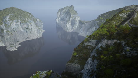 Vista-Aérea-Sobre-Piedras-Blancas-En-El-Fondo-Del-Océano-Y-Acantilados-De-Tiza