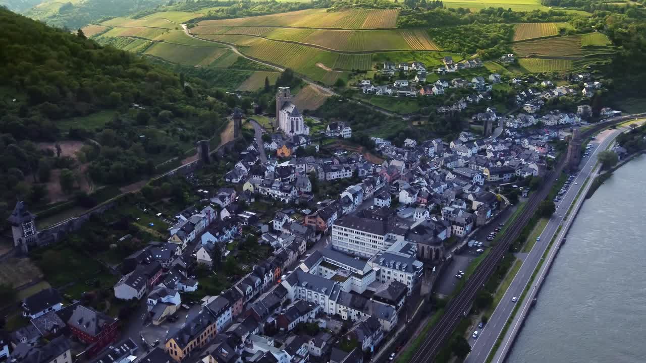 Oberwesel Town in Rhine Valley amid Medieval Fortifications and Vineyards Hills, Aerial View