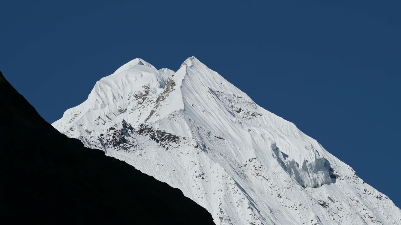 Himalayas Mountains Close Up in Nepal with Clear Blue Sky, Snowcapped Winter Himalayas Mountains Covered in Snow in Nepal, Annapurna Mountain Range a Popular Hiking and Trekking Area