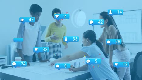 animation of social media icons with numbers over diverse business people having meeting at office